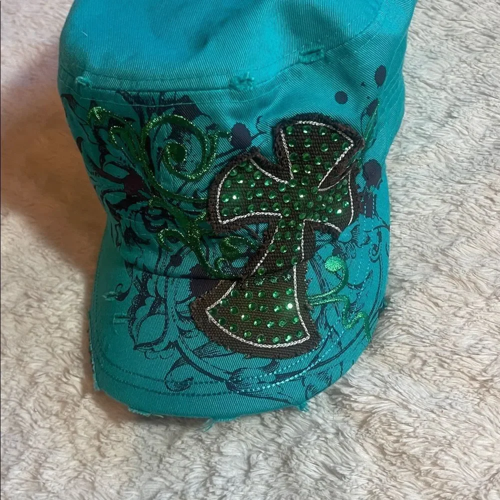 Teal Cap with Green Cross Design